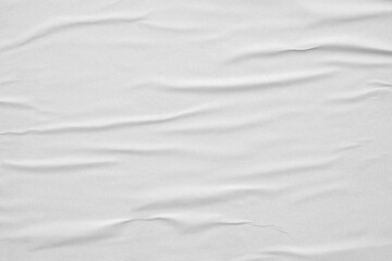 Blank white crumpled and creased paper poster texture background