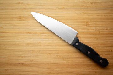 Knife on the background of the cutting board