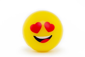 Emoji in love. Emotion of happiness. Amorously smiling emoticon. Cartoon style. Smile icon.