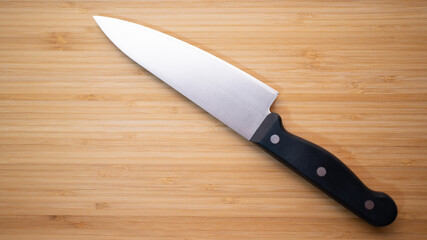 Knife on the background of the cutting board