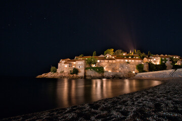 Fototapeta premium Sveti Stefan island town. view of the night city in Montenegro
