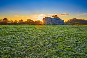 Tobacco barn at sunrise in Gravel Switch, Kentucky. - Powered by Adobe