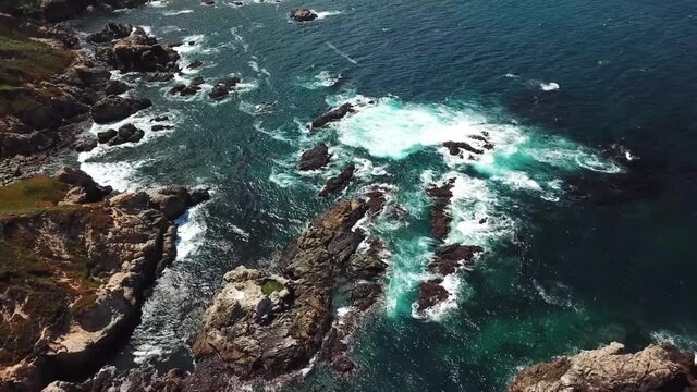 Garrapata State Park In California USA with rugged rocky coastline, Aerial flyover view