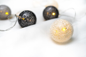glowing christmas garland. Balls of threads.