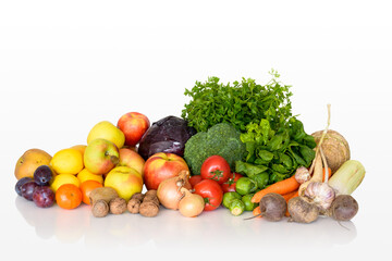 fresh, organic vegetables and fruits isolated on a white background with a clipping path 