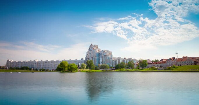 Minsk. Belarus summer 2020. View on old and new part of the city of Minsk from oposite side of the river. Time lapse