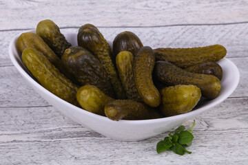 Pickled cucumbers heap in the bowl