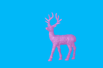 Reindeer silhouette on blue backdrop