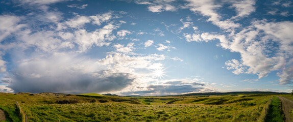 Panorama of a green landscape in Iceland.