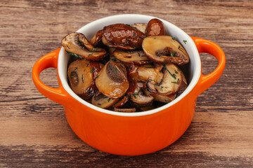 Roasted champignon with herbs and spices