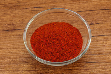 Dry paprika powder in the bowl