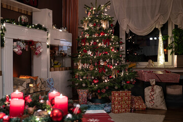 It's Christmas Eve. The candles on the Advent wreath are burning, the tree is decorated. Christmas presents are under the tree.