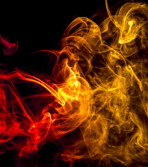 Fototapeta premium Colored smoke on black background