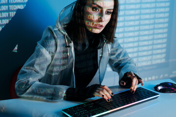 Internet, crime, cyber attack, system breaking concept. Blue neon light background. Woman hacker is...