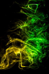 Colored smoke on black background