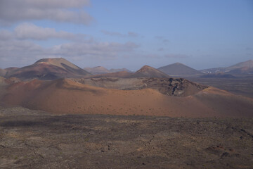 Fototapeta na wymiar The volcano based desert landscape of Timanfaya