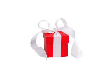Front view of red gift box with white ribbon isolated on white
