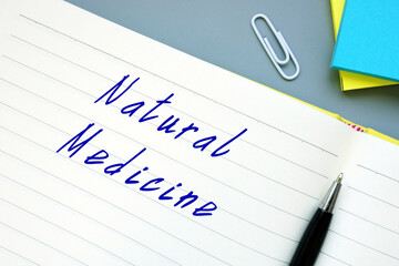 Natural Medicine sign on the piece of paper.