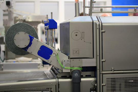 roll of packaging film on machine