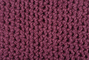 Close up of purple knitted wool texture