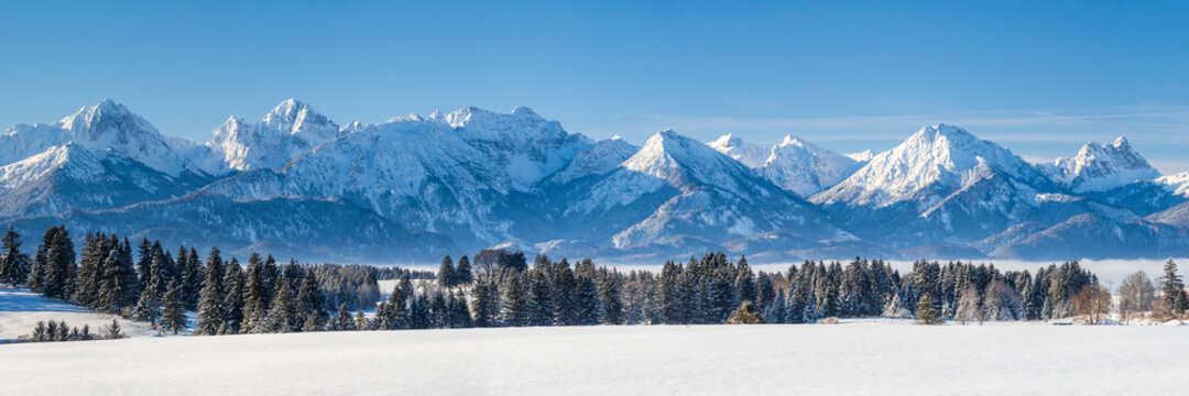 panoramic landscape at winter with alps mountains in Bavaria