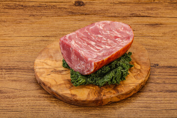 Beef ham piece over board