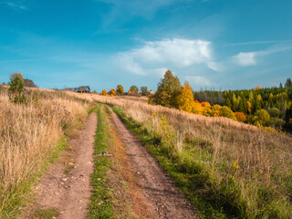 Dirt road at the Stone Hill in the autumn, in a sunny day.