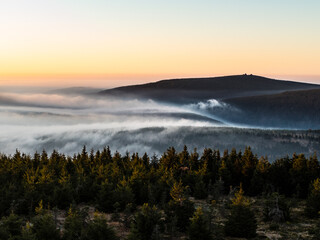 sunrise above the clouds of inversion i the valley