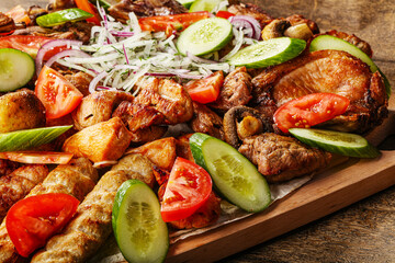 Grilled various meat mix vith vegetables