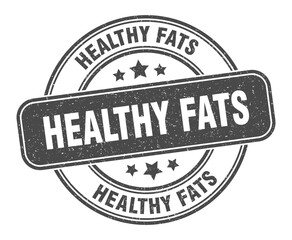 healthy fats stamp. healthy fats label. round grunge sign