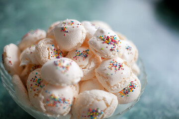 Meringue. sweet meringues. Meringue tray. Close up photo of meringues. Dessert Background