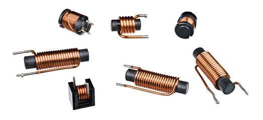 Set of solenoid coils with black ferrite core isolated on white background. Close-up of cylindric inductors with helical copper wire winding. Group of electronic components. Electromagnetic induction. - obrazy, fototapety, plakaty