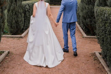 groom with bride together autumn park at wedding