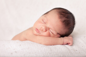 Newborn Baby Sleeping Peacefully at Home, Color Portrait