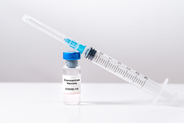 Coronavirus Vaccine. Corona virus Vaccine concept with Vial and Syringe on white background.