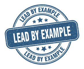 lead by example stamp. lead by example label. round grunge sign
