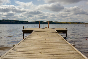 Fototapeta premium Wooden dock near the waterside, Lake Saimaa.