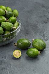 Feijoa fruits in studio at black background