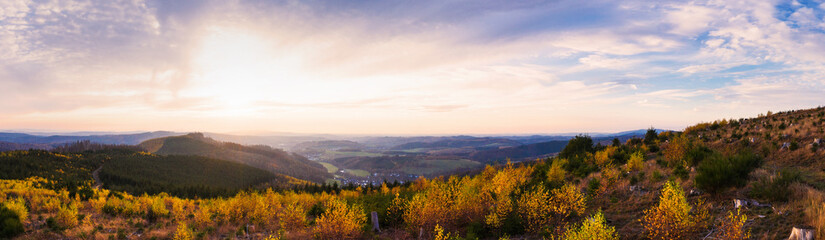 the rothaar mountains in germany with a view towards siegen city as panorama