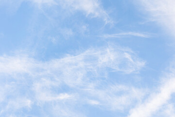white veil clouds in the blue sky