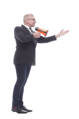 in full growth. a smiling business man with a megaphone