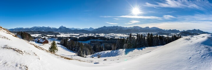 Fototapeta na wymiar panoramic landscape at winter with alps mountains in Bavaria