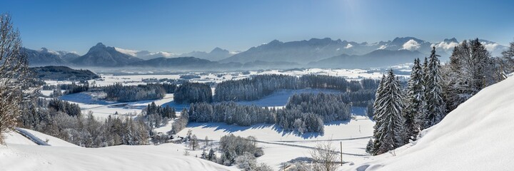 panoramic landscape at winter with alps mountains in Bavaria