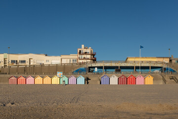 Vintage beach cabins on the French opal coast in Stella Plage. - obrazy, fototapety, plakaty