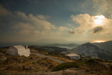 View at Ios main village or Chora at sunset time from a viewpoint in the mountain above, Ios island, Greece