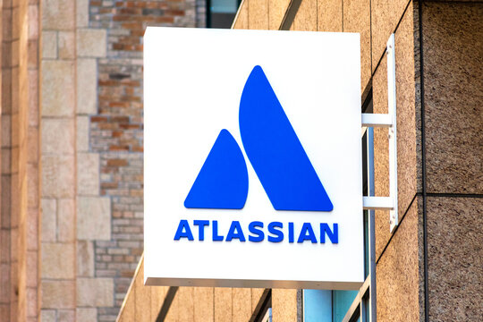 Atlassian logo at HQ of Australian enterprise software company. Atlassian develops tools for software development, project management, and content management. - San Francisco, California, USA - 2020