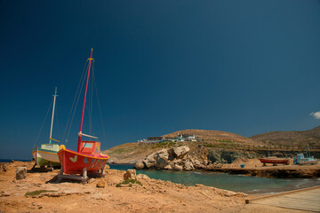 View at famous Pathos bar and painted colorful fishing boats near the sea