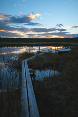 Sunset at a little pier at a lake in Sweden