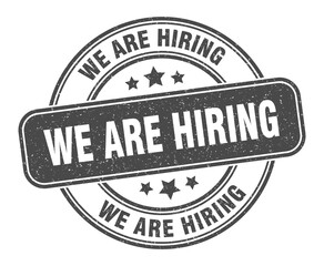 we are hiring stamp. we are hiring label. round grunge sign