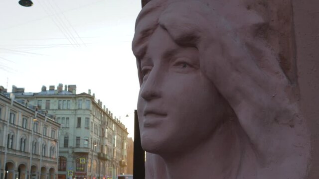 building is decorated with high-relief compositions of female busts architecture classicism